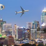 Bangkok Cityscape, Business district with high building, CCTV, airplane at dusk.